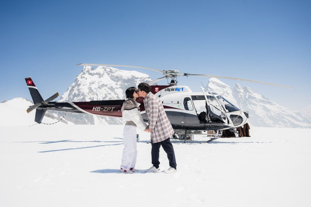 Proposal with a Helicopter on a Glacier in Switzerland Proposal with a Helicopter on a Glacier in Switzerland